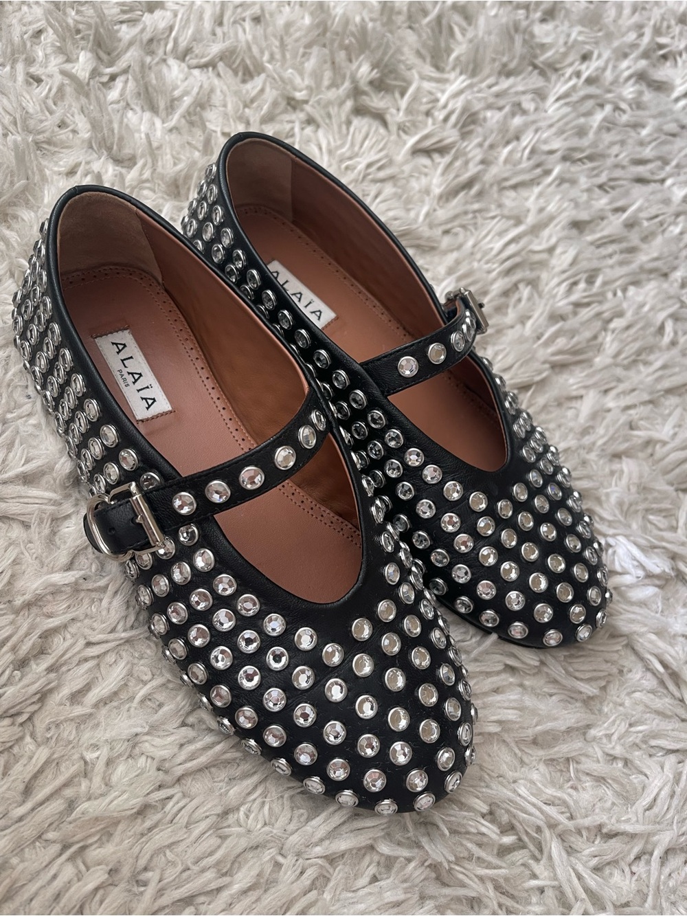 Alaia Black Leather Studded Mary Jane Flats with Silver Accents